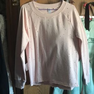Pink sweater with holes never been worn!